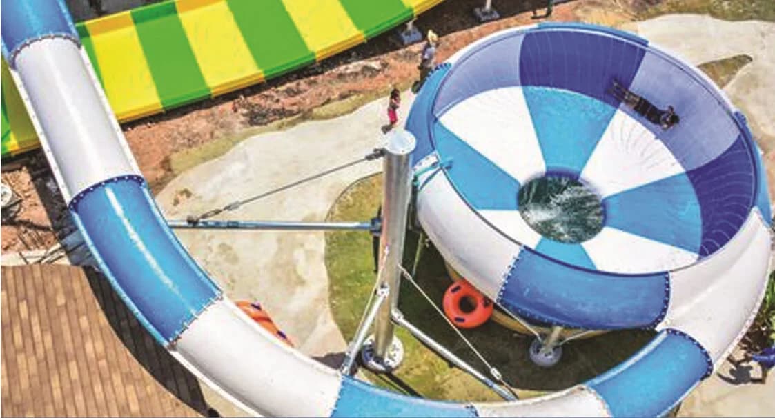 Body Bowl - A circular bowl in which the riders enter through a tunnel slide and oscillate in the bowl before falling through the center in the pool.