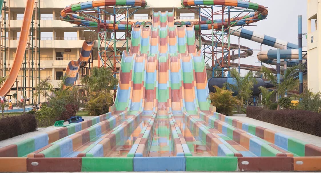 Multi Lane Racer - This is a combination of 7 matt racer slides with a downhill slope where in the riders in each lane can race with each other sliding head first.