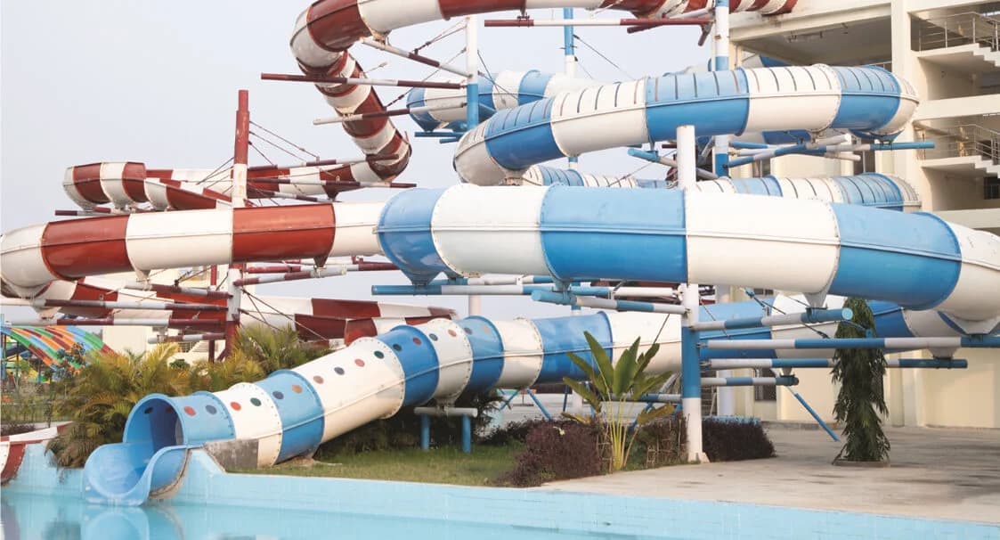 Typhoon Tunnel - A turning closed tube float slide where in rides slide down with high thrill of sway on turns.